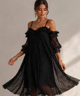Vestido negro de muselina con hombros descubiertos y bordes de encaje