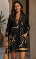 Vestido mini negro con estampado de mármol dorado y encaje de ganchillo
